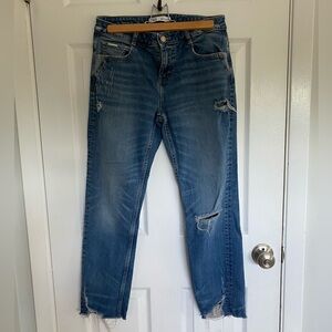 Zara distressed jeans.